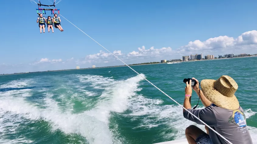 Parasailing is an exciting adventure to enjoy together