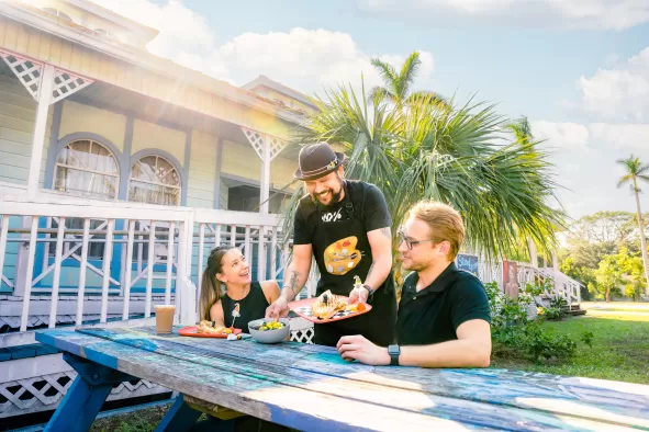 couple eating at picnic table